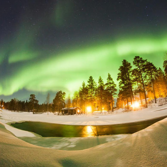 Auroras at Vaattunki Wilderness Resort, Safartica in Rovaniemi