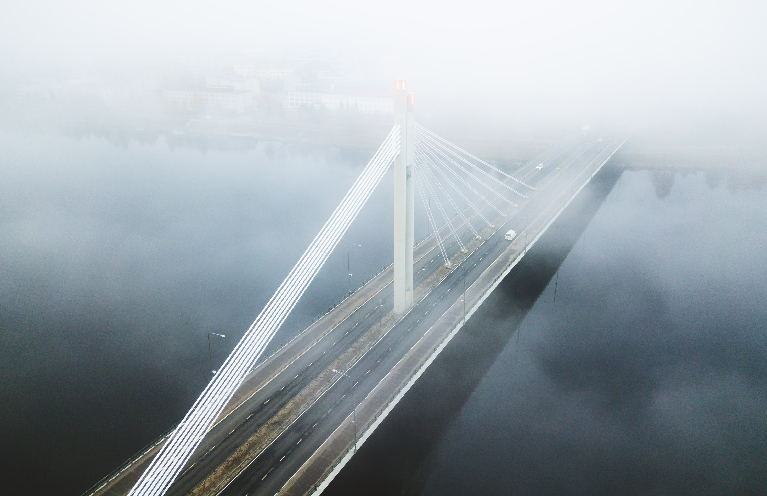 Lumberjack's Candle Bridge pictured from above during early winter with some mist in Rovaniemi, Lapland, Finland.