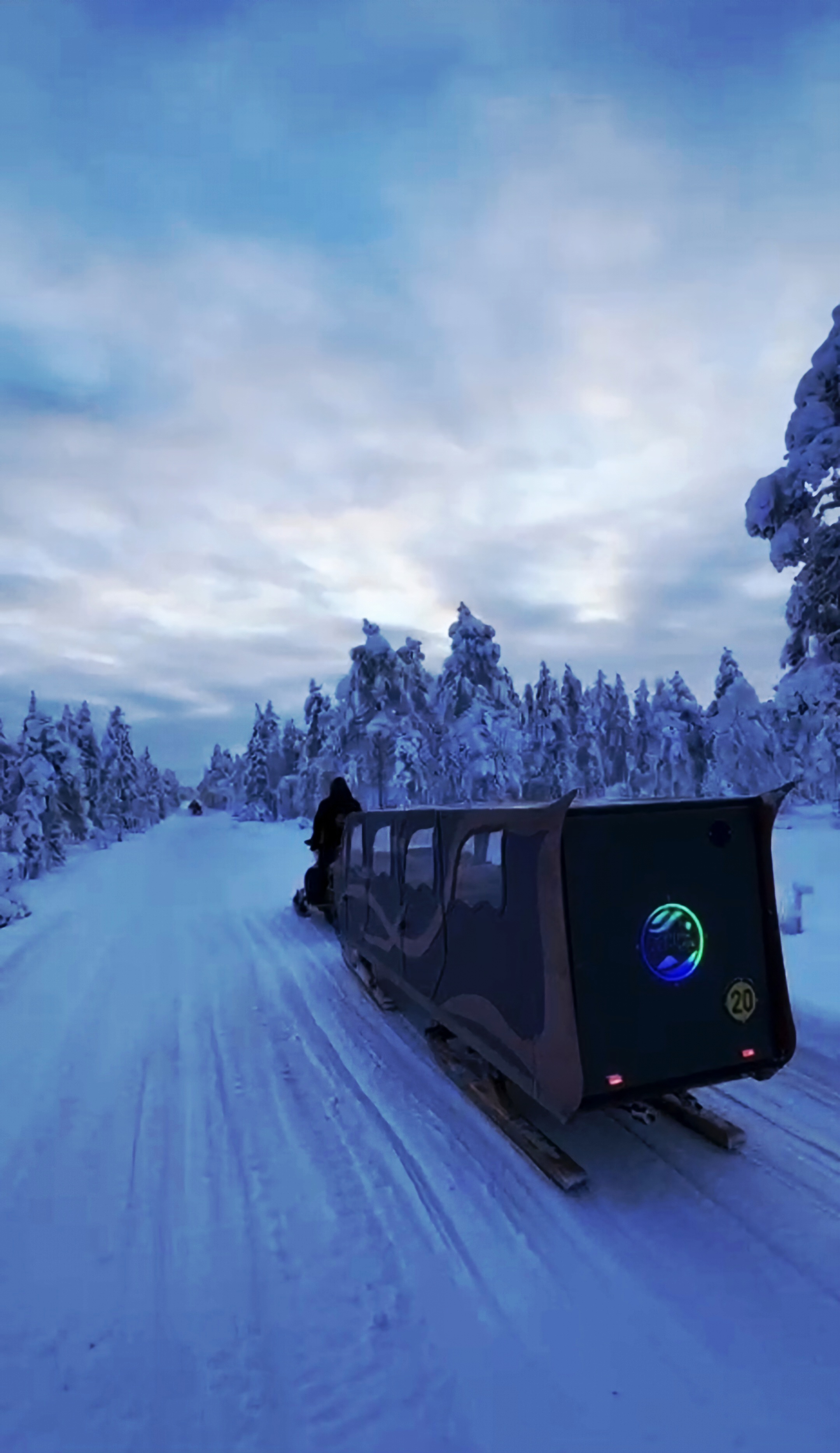 Northern Adventures' Sledge on snowy path in Rovaniemi, Lapland, Finland.