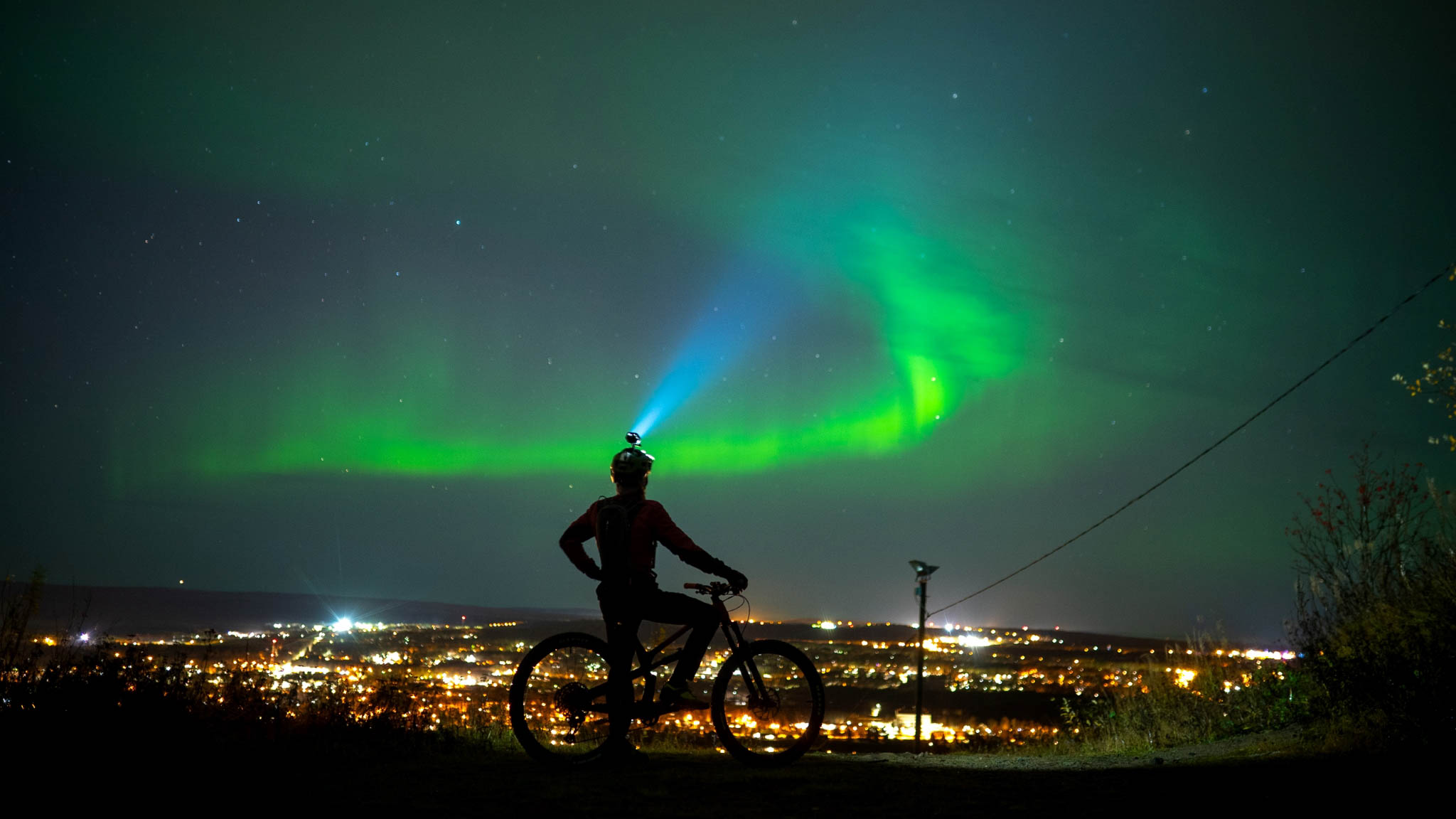 Northern lights on Mountain bike, RollOutdoors, Rovaniemi, Lapland, Finland