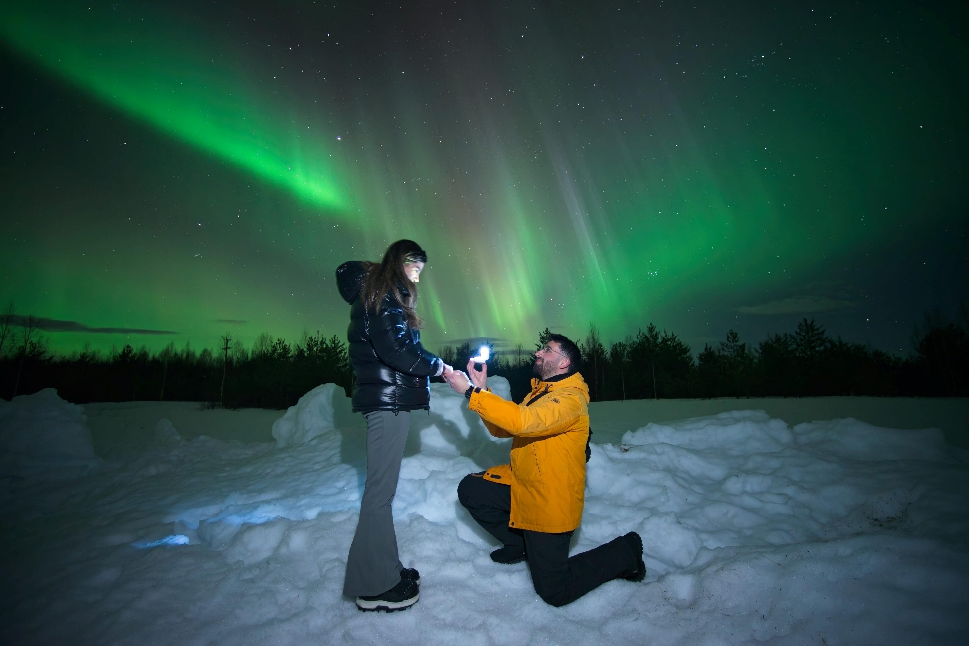 Proposal under the Northern Lights with Arctic Origins tour.