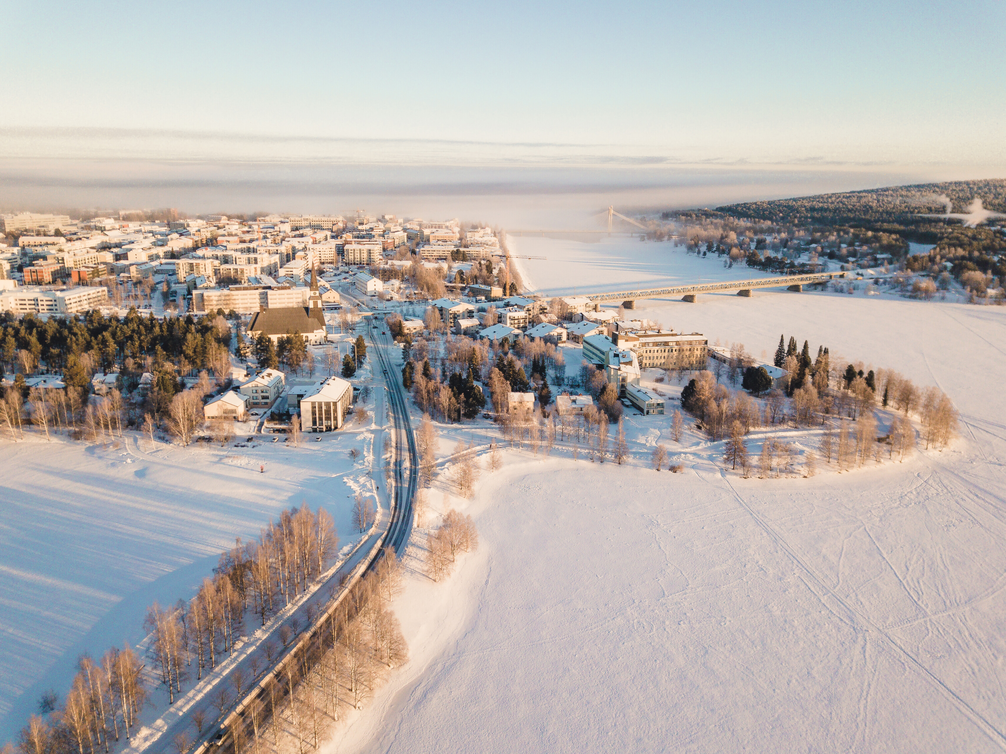 Rovaniemi city pictured from above in winter scenery with snow and ice. Rovaniemi, Lapland, Finland.
