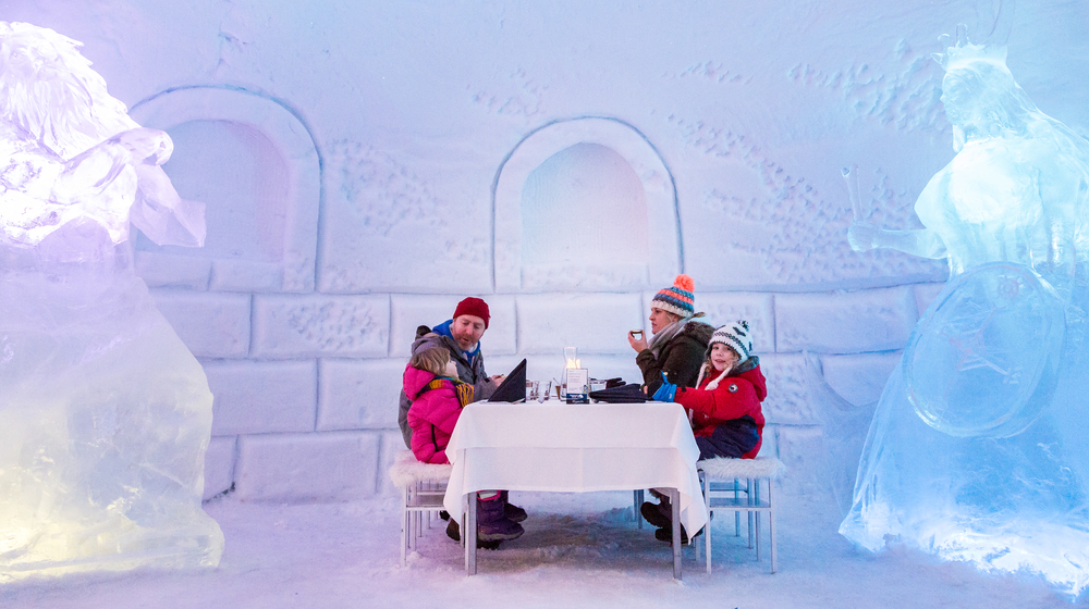 Dinner with family in Snowman World Ice Restaurant, Santa Claus Village, Rovaniemi, Lapland, Finland