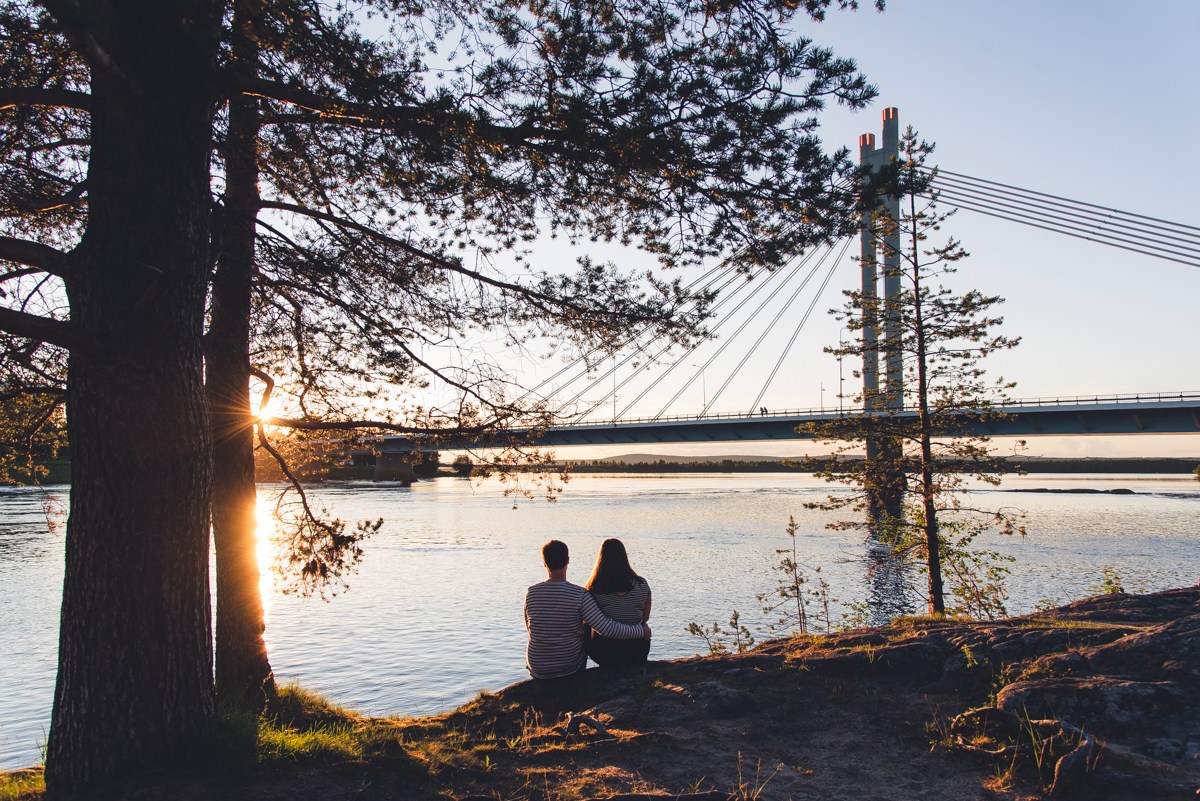 Summer 2020 Couple by Lumberjacks Candle Bridge in Rovaniemi Lapland Finland