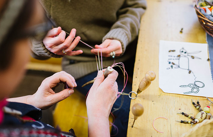 Making local handicrafts in Hornwork workshop in Rovaniemi, the Official Hometown of Santa Claus
