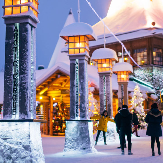 Crossing the Arctic Circle in Santa Claus Village in Rovaniemi, Lapland, Finland
