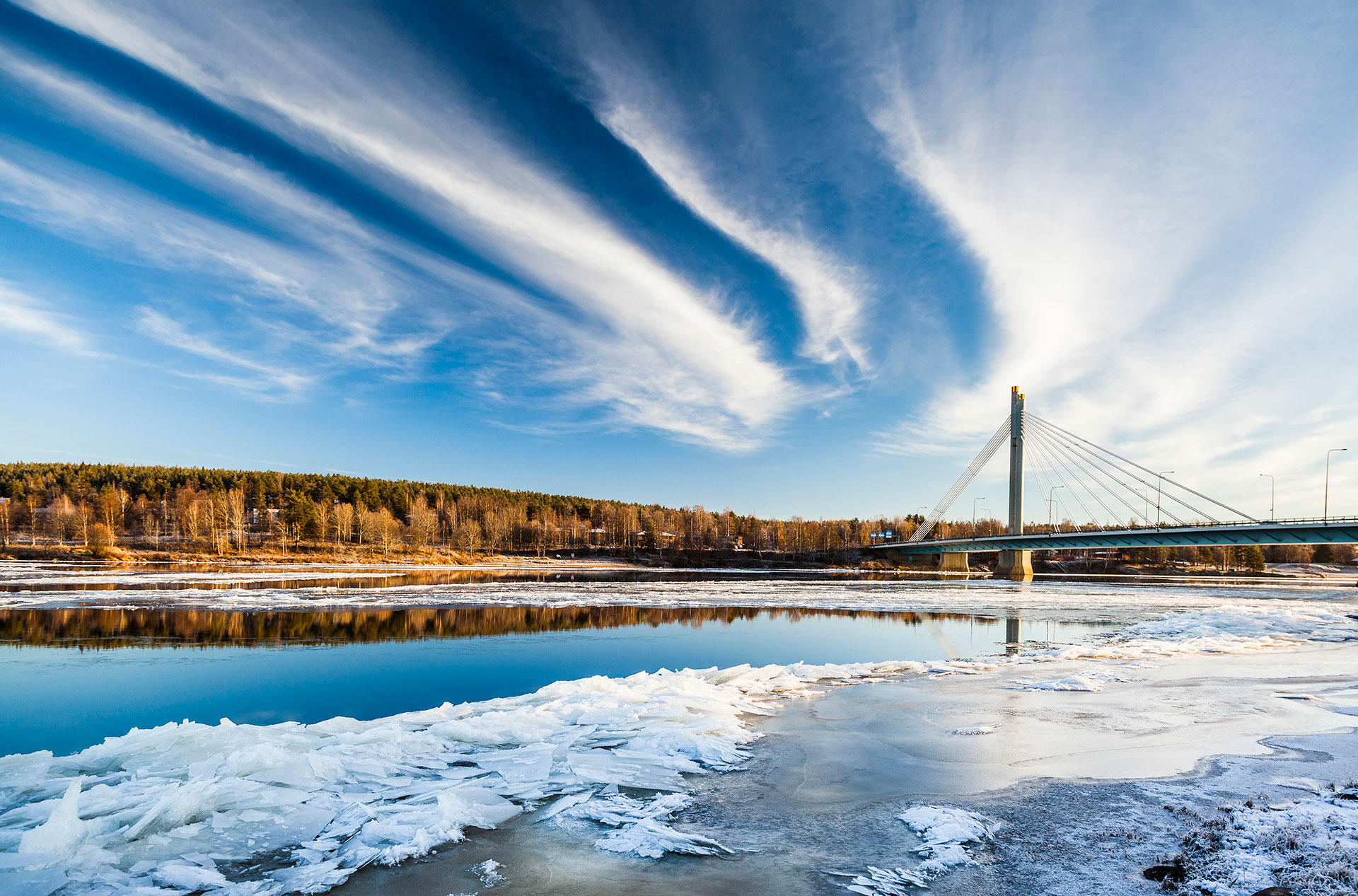 The river ice breaks and flows downstream in the spring in Rovaniemi, Lapland, Finland