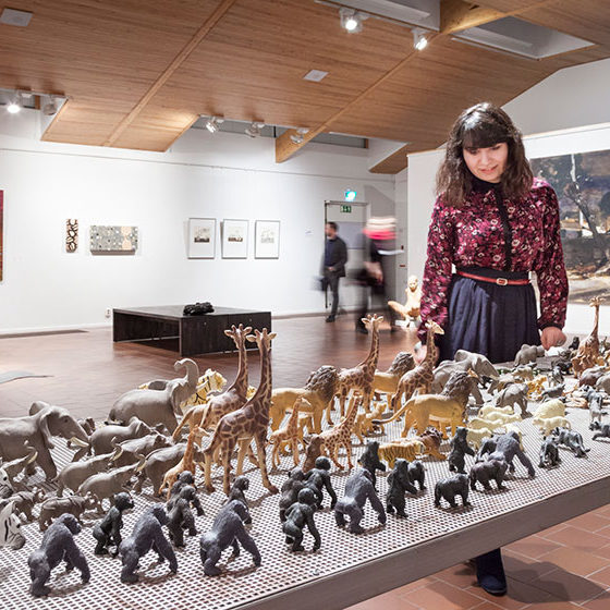 Lady looking at art in Korundi House of Culture in Rovaniemi, Lapland, Finland